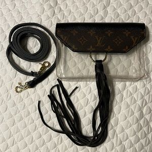 Clear bag with black leather and authentic Louis Vuitton accent
